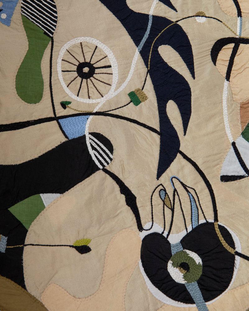 Hand made decorative tapestry with an abstract and surrealist design motif. Hand crafted and hand embroidered from antique silks. Made in India, artisanal home decor. Modern tapestry design. 