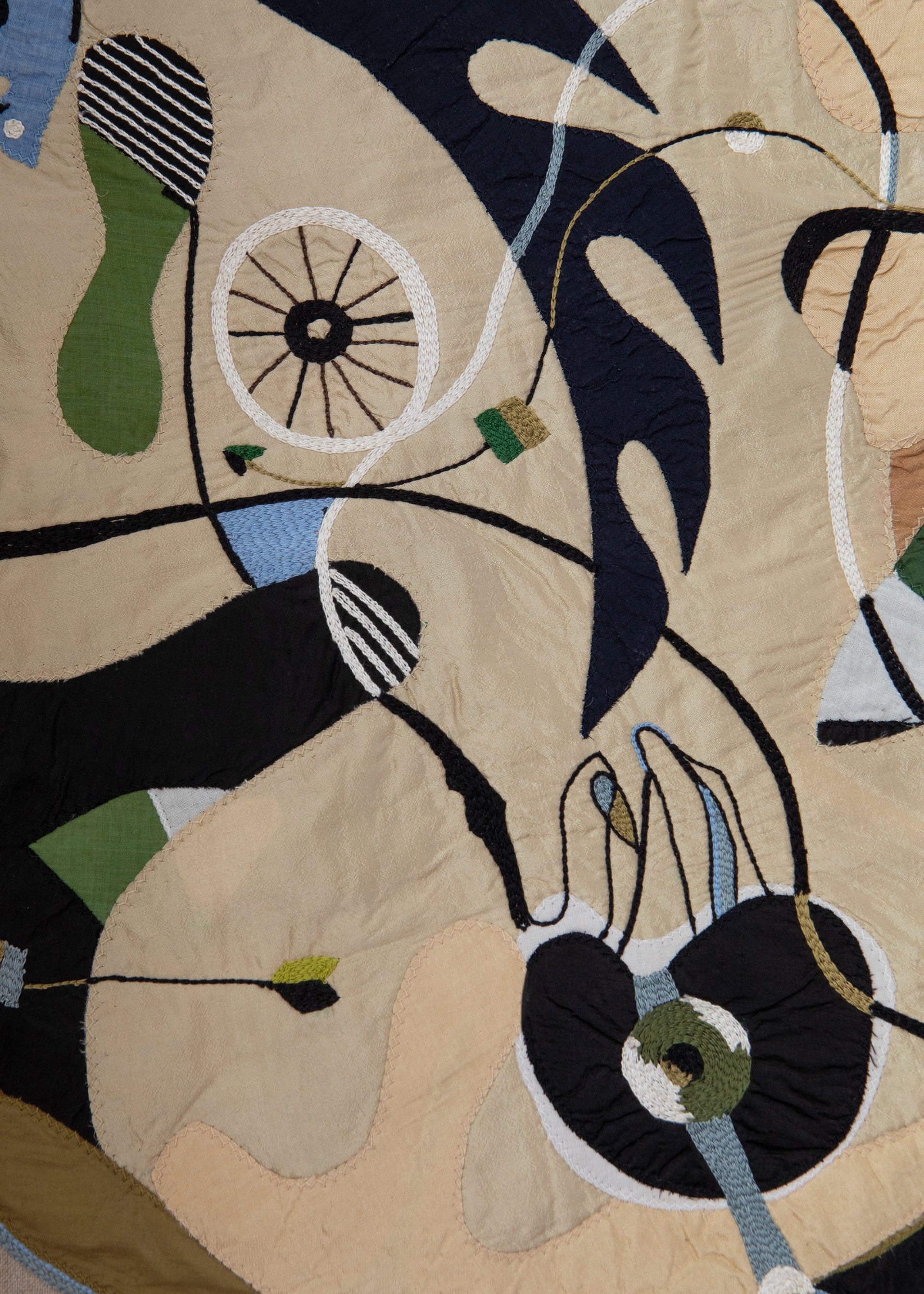 Hand made decorative tapestry with an abstract and surrealist design motif. Hand crafted and hand embroidered from antique silks. Made in India, artisanal home decor. Modern tapestry design. 