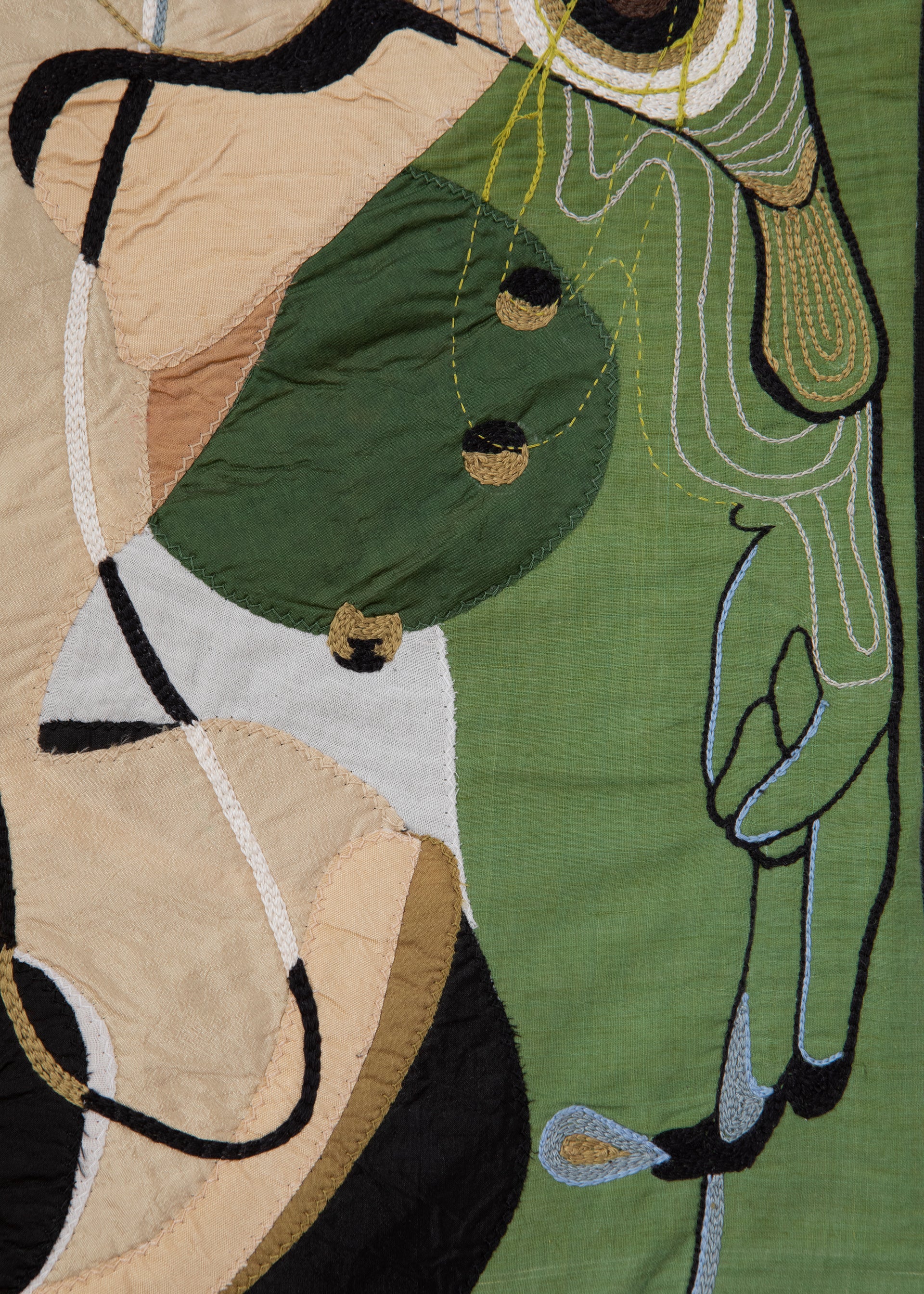 Hand made decorative tapestry with an abstract and surrealist design motif. Hand crafted and hand embroidered from antique silks. Made in India, artisanal home decor. Modern tapestry design. 